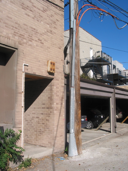 Close up view of the back of the 957 W. Montana garage and 961 W. Montana, looking north-east