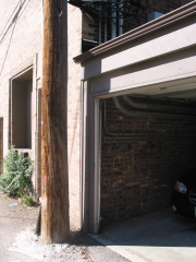 Close up view of the back of the 957 W. Montana garage and 961 W. Montana, looking north-west
